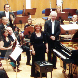 İdil Biret and conductor Antoni Witt saluting the audience with Bilkent Symphony Orchestra after a concert where Beethoven’s concerti were performed by Biret, 22 January 2008.